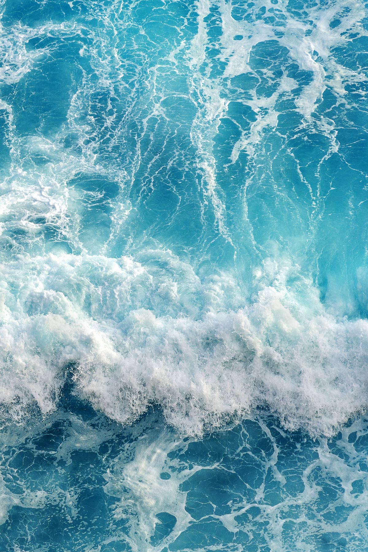 Aerial view of ocean waves.